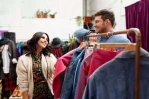couple shopping in vintage clothing store