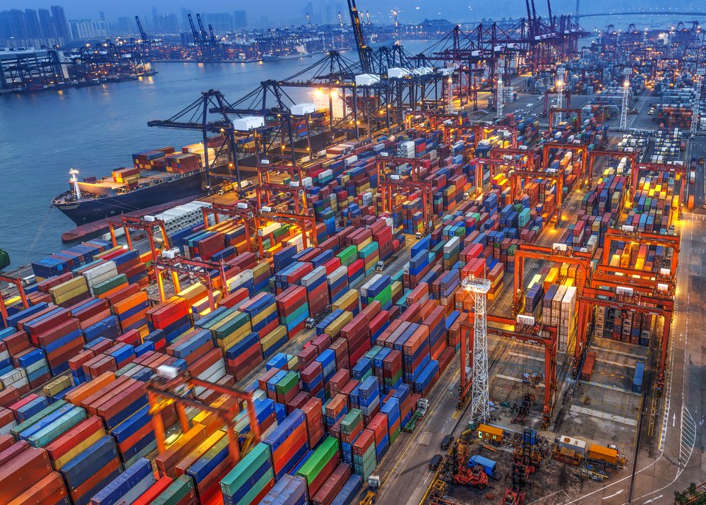 massive container port loading & unloading vessels