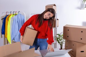 woman receiving overstock inventory for her business